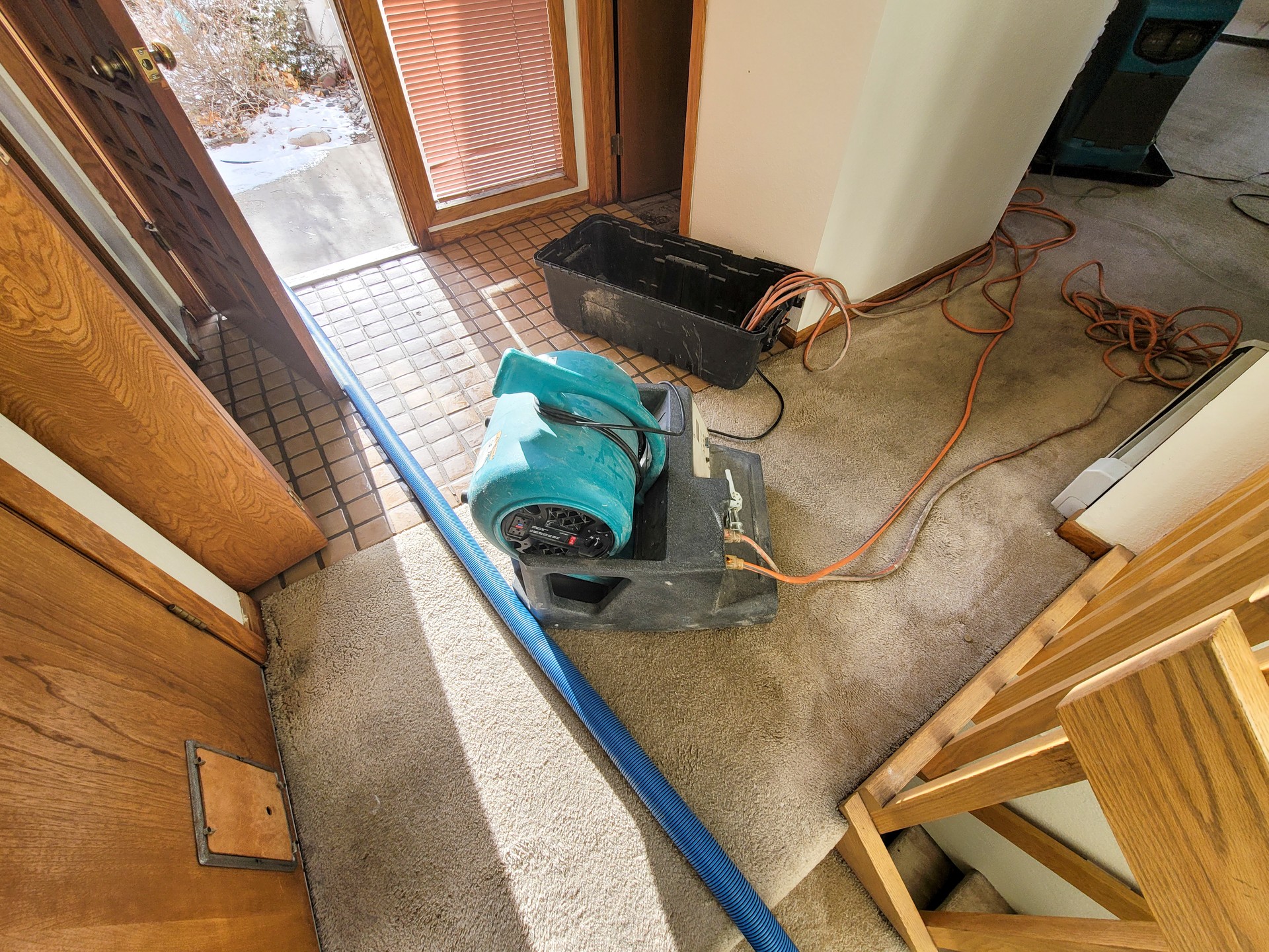 Air Mover and Heater placed in a water damaged home to dry it out